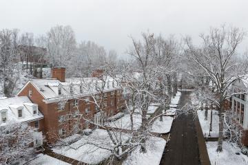 Ohio University's Athens Campus is shown on January day with snow in the trees, on the ground and covering several residence halls