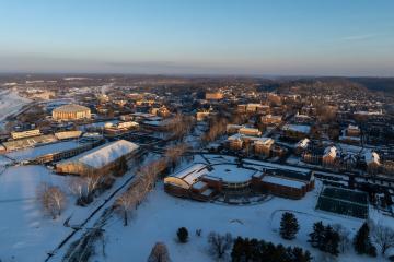 The OHIO campus is shown covered in snow at sunrise in this aerial image