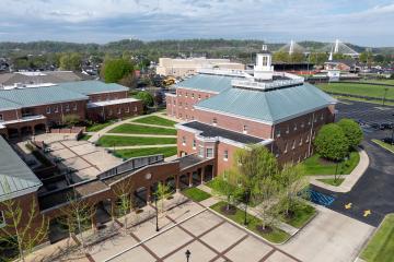 The OHIO Southern Campus with the community behind it, including the bridge over the Ohio River