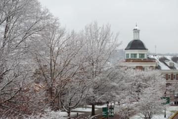 Baker University Center and the trees around it are covered in snow and ice