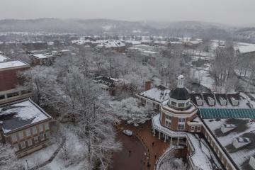 Baker University Center and the area around it is shown from above on a snowy winter day 