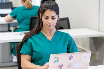 A nurse professional earning their MSN degree from OHIO Online.