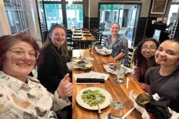 OHIO students and an alumnus share a dinner at Latitude 39