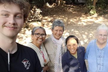 OHIO Student Quentin Cole and some befriended locals in Thailand