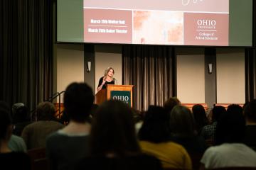 Jennifer Egan speaks from a podium
