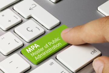 A green button on a keyboard reading "MPA Master of Public Administration"