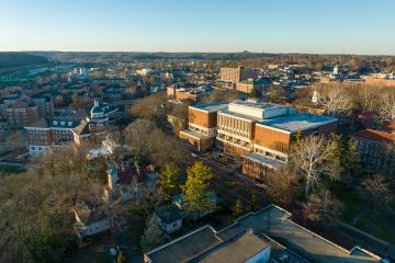 An exterior drone shot of Alden Library.