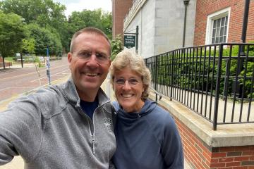 Charlie and Becky Kendall stand in front of RTV Building at Ohio University