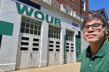 Robb Metry is shown outside of the WOUB building at Ohio University