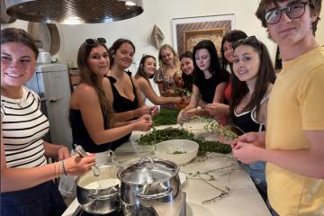 A group of students making Sicilian food.