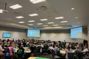 Group of people learning how to instruct learning communities. 