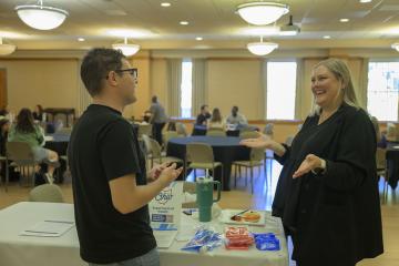 An OHIO student talks with a public office at Public Service Day