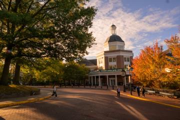 Baker University Center is surrounded by colorful trees on a Fall day