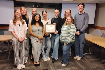 Ohio University SPJ members stand together and hold the national award