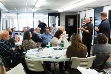 Members of the Mayors Partnership for Progress listen to a presentation