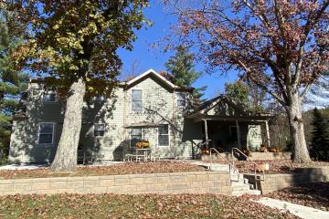 The outside of the Serenity Grove facility is shown on day in Fall
