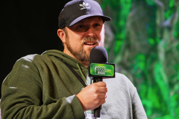 Man speaking into microphone