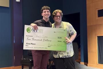 First-place Three Minute Thesis winner Mihajlo Chonev, a computer science master’s student from the Russ College, who presented his thesis work, “From drones to data: A modernized machine learning approach to bridge inspection.”