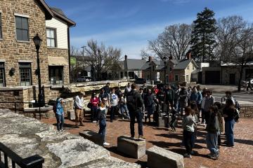 Students listening to a talk about infrastructure in historic Dublin, OH. 