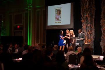 Riya Jacob receives the Rudy Leadership Award at the Leadership Awards Ceremony in the Baker University Center Ballroom