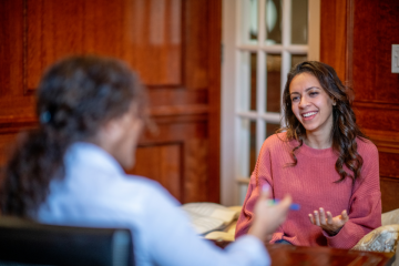 counselor talking to patient in office