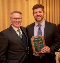  David Wilhelm presented Steven R. Schoeny with award